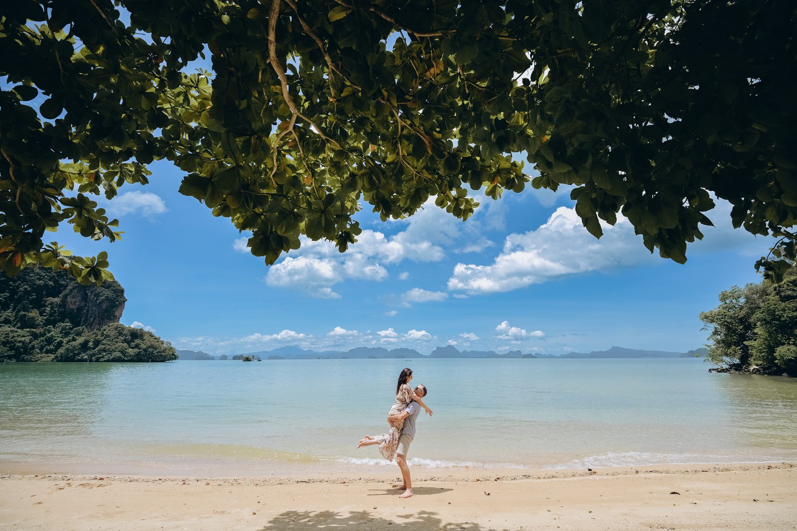 Mother and child at a secluded cove beach in Khao Lak